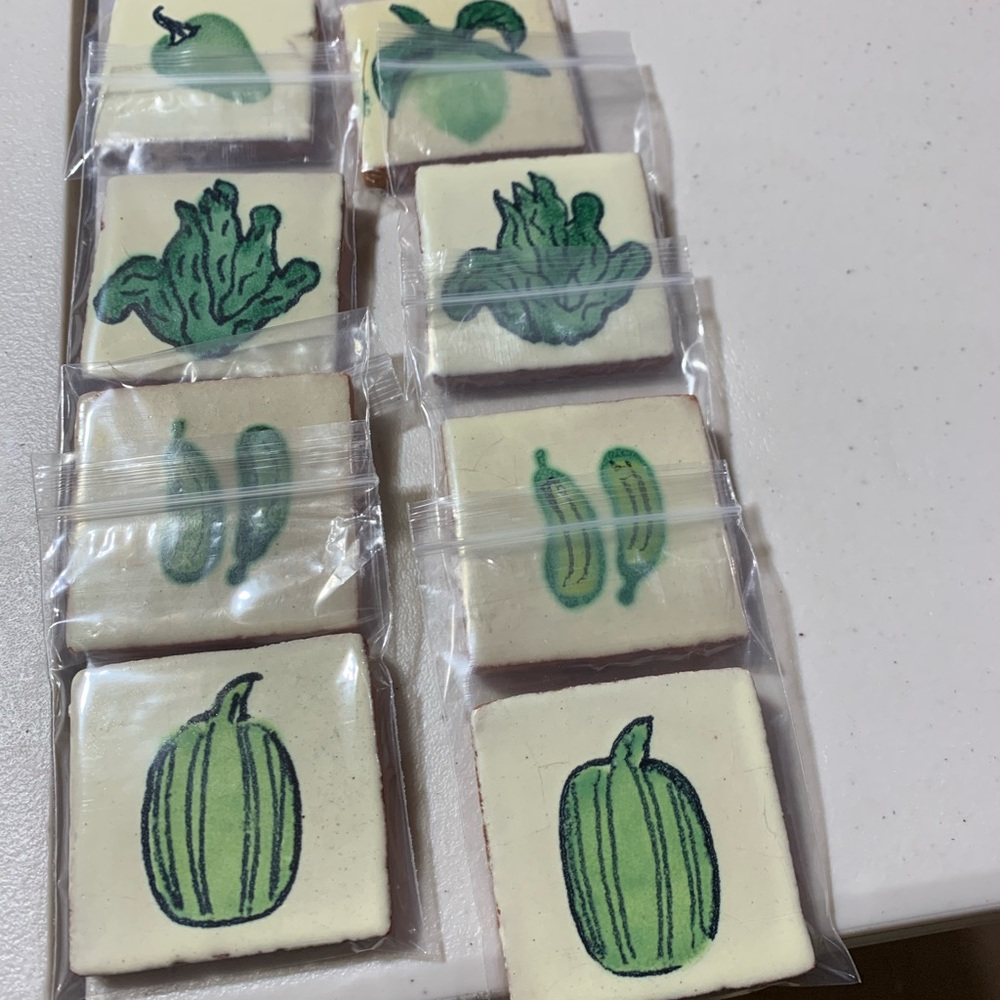 Handcrafted terracotta hand painted Mexican tiles made into magnets 2 sets of 4